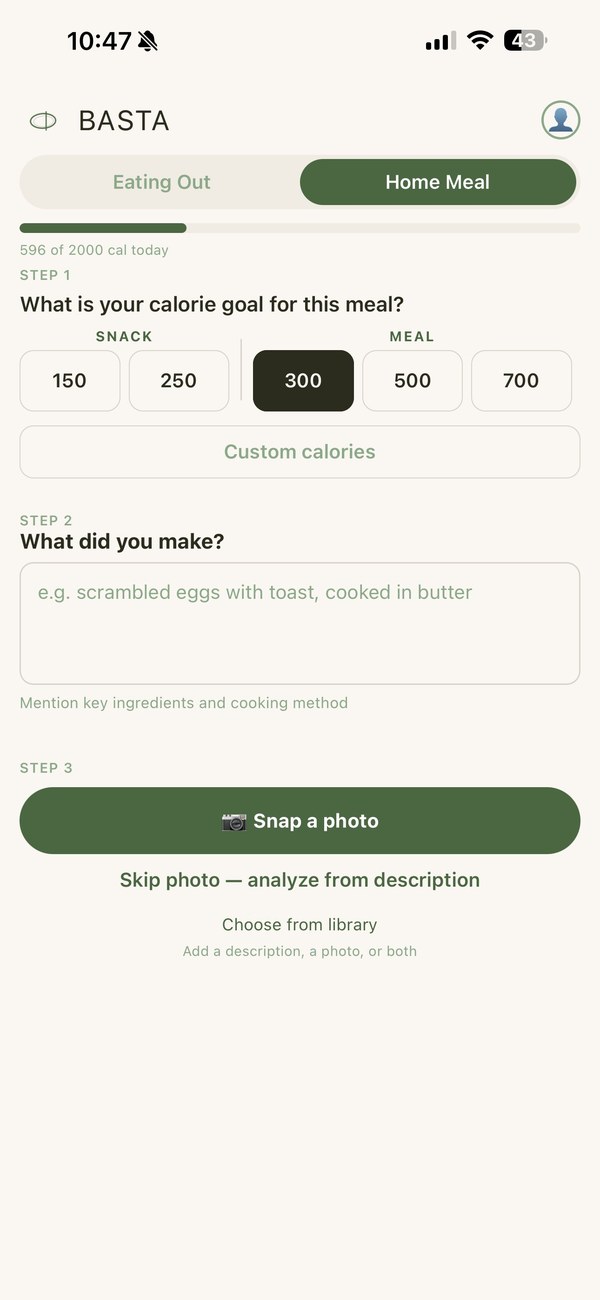 Basta home screen showing meal type toggle, calorie goal options, and photo capture